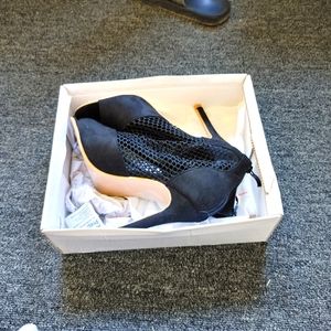 Black fishnet heels peptoe